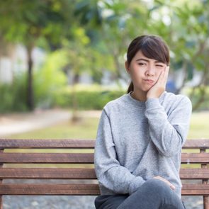 Woman has toothache coppy space