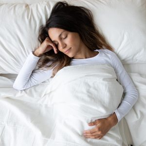 overhead view of woman sleeping