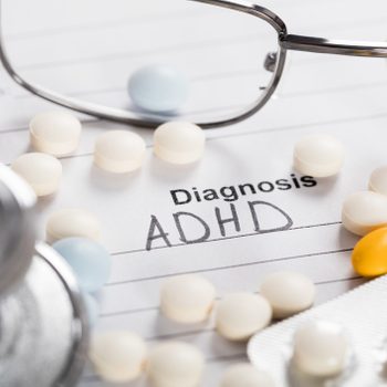 Pills;Glasses And Stethoscope With Text Diagnosis ADHD