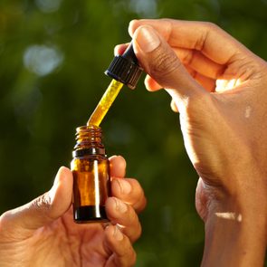 a dropper containing CBD oil