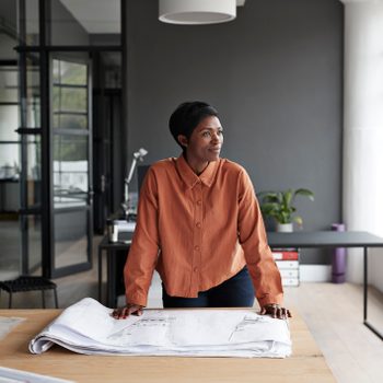 Entrepreneur looking away at workplace