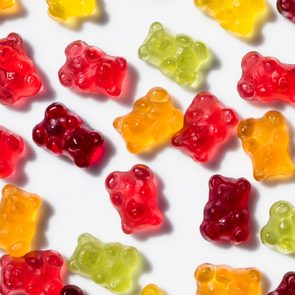 High Angle View Of Colorful Gummi Bears On White Background