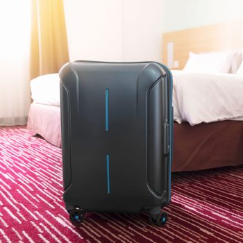 suitcase in a hotel room