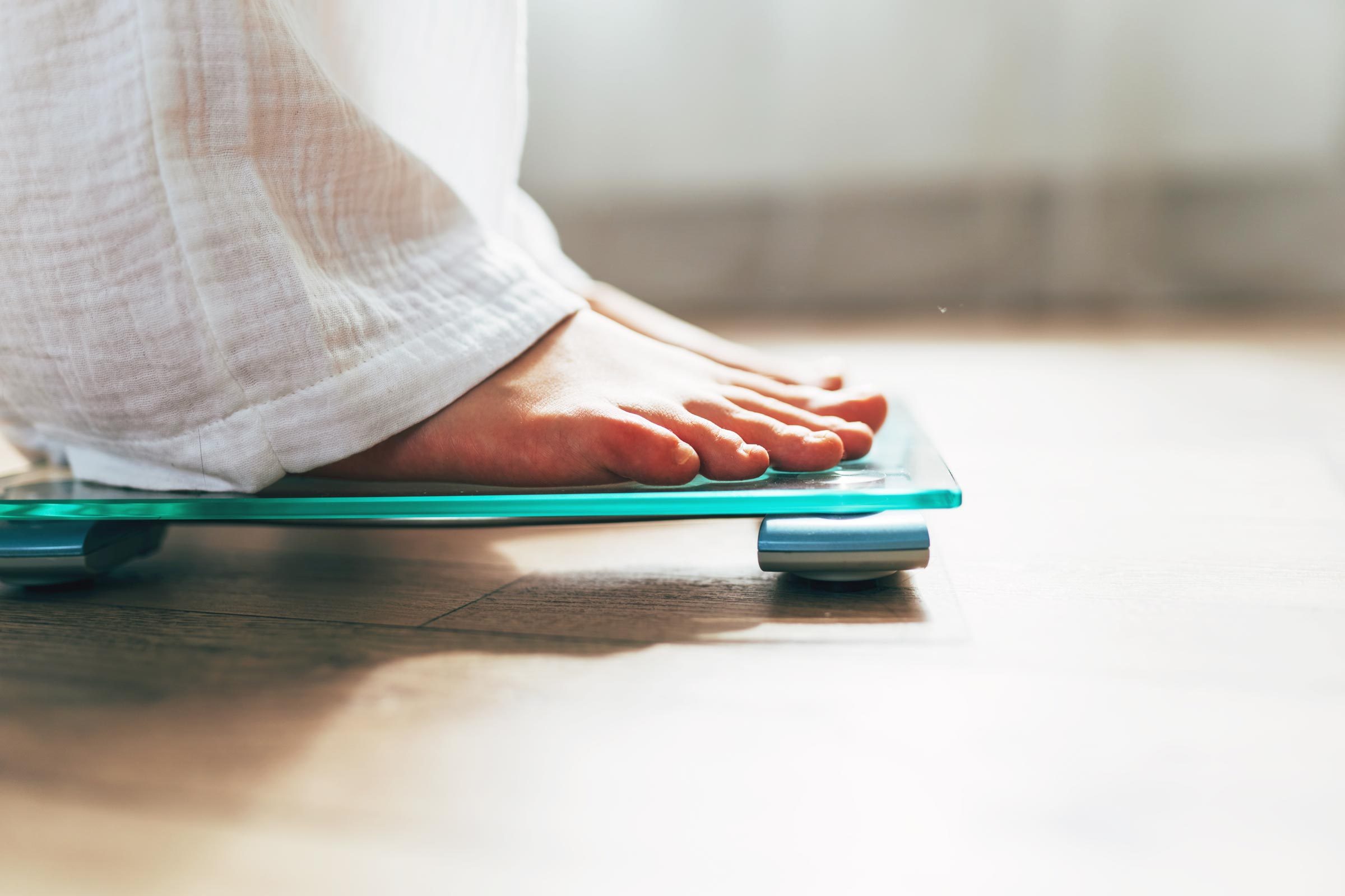 Here’s How Often You Should Really Weigh Yourself, Say Expert Doctors